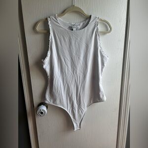 And Now This White Sleeveless Bodysuit